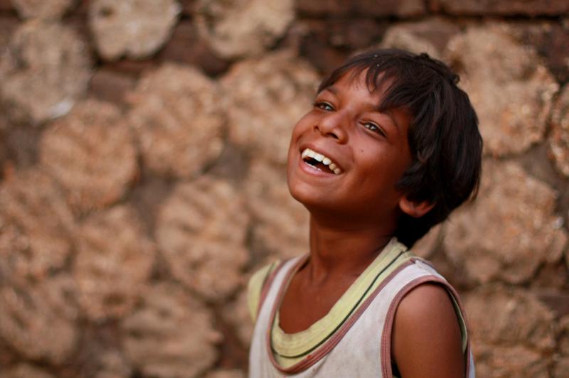 A boy watching for falling kites, Kite Festival in Gujarat