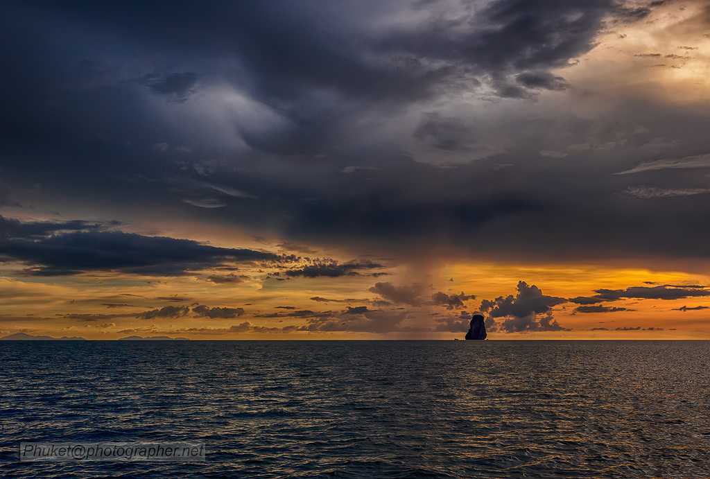 Sunset with rain at Andaman Sea